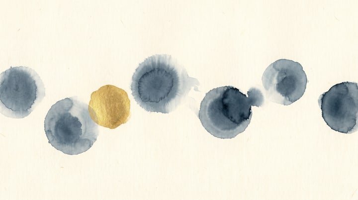 Sumi-e wash: a row of round ink blots of different weights along a gentle wave, one of them gold.